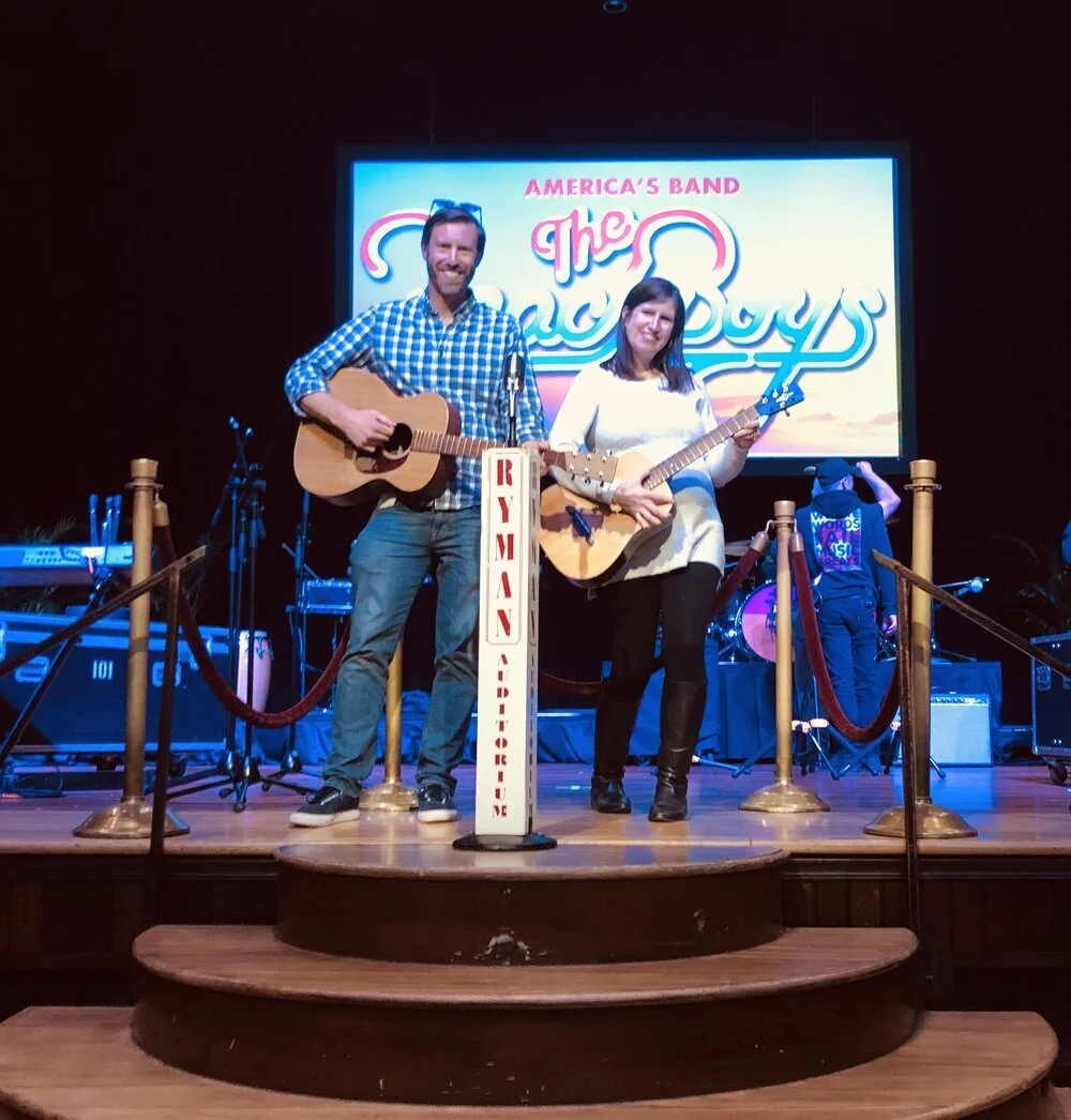 At the Ryman Auditorium with guitars